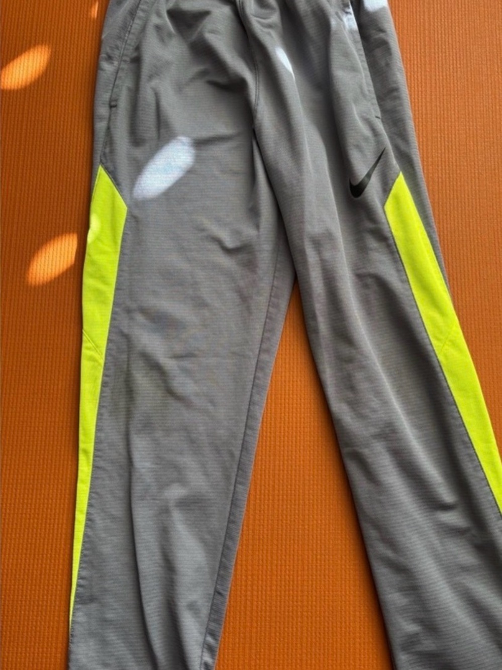 Nike Gray Joggers with Neon Yellow Side Panels and Black Swoosh